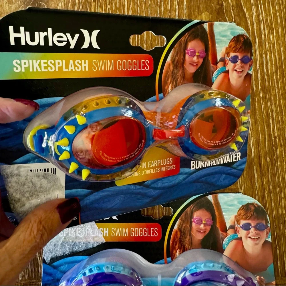 1 set of 2 Hurley kids’ swim goggles, 1 blue, 1 orange